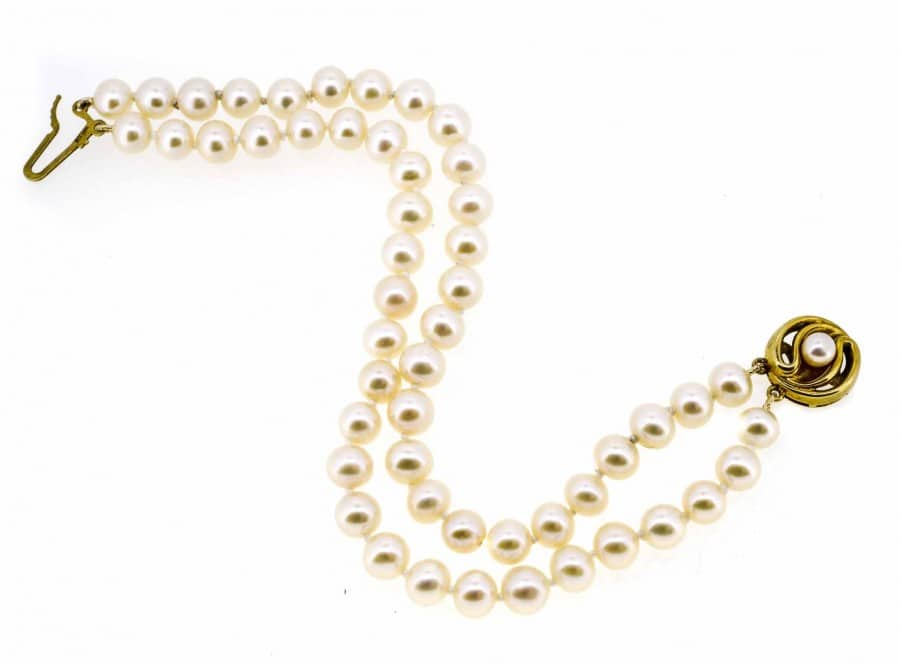 A Schoeffel cultured pearl necklace, formed a string of different colour  pearls of diameter approx. 7mm each, with signed 18ct. white gold clasp,  length 61.5cm, in Coleman Douglas Pearls case. Condition: Very