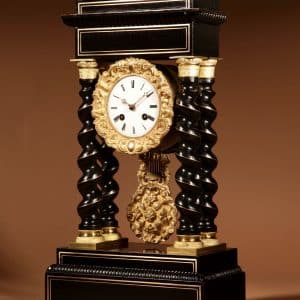 An Original Ebonised and Brass Inlayed French Portico Clock circa:1870 19th century Antique Clocks