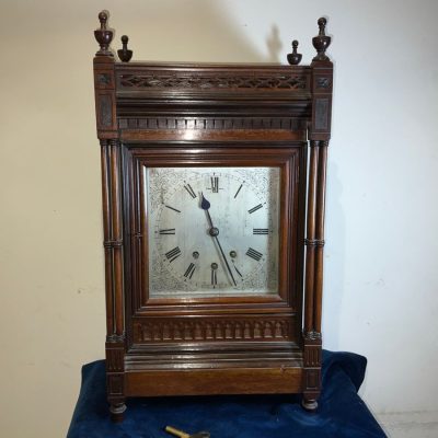 Musical mahogany triple train on eight bells mantel clock