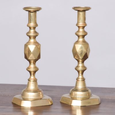 A Pair of Brass ‘King of Diamonds’ Candlesticks